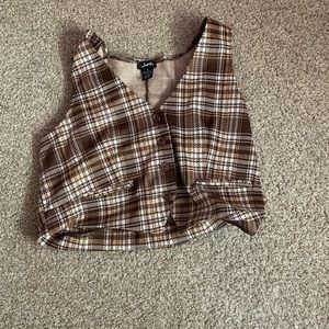 Brown button-up vest: timeless style.